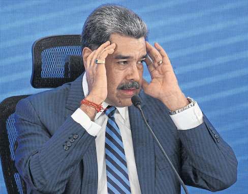 Maduro elusive on attack, open to talks