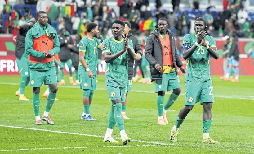 Senegal and Mali march on to quarters