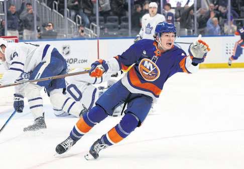 Isles win in OT, spoiling Matthews' historic goal for Maple Leafs