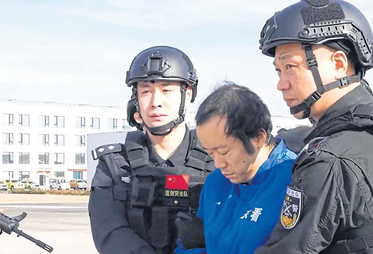 China TV shows 'scam centre boss'
