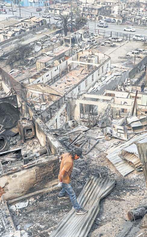 Chile wildfires rage, wiping out towns