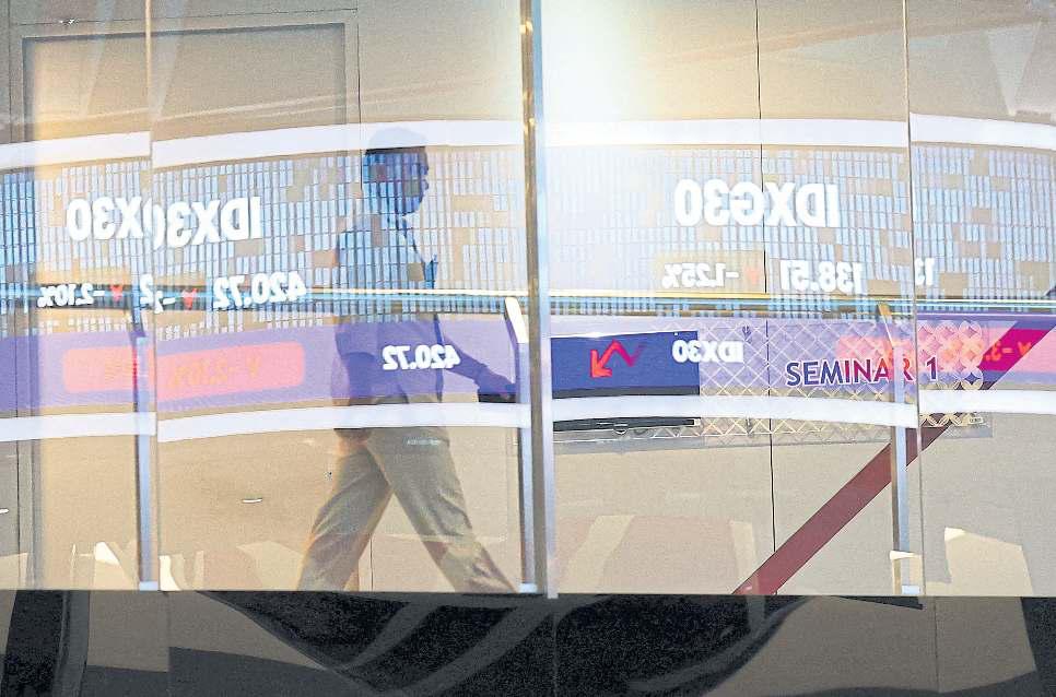 Indonesia downgrade hits stocks