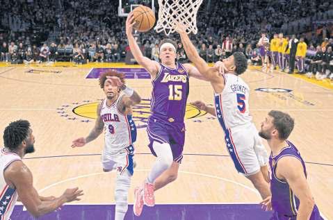 Doncic down, Lakers rally to beat Sixers