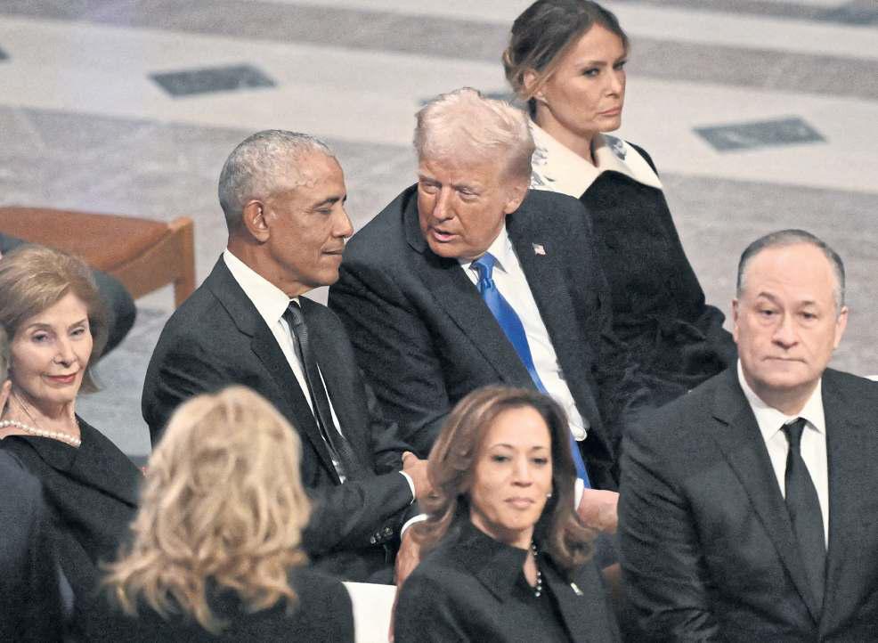 Trump posts racist clip of Obamas