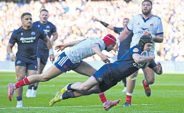 Scotland shock France to blow title race wide open