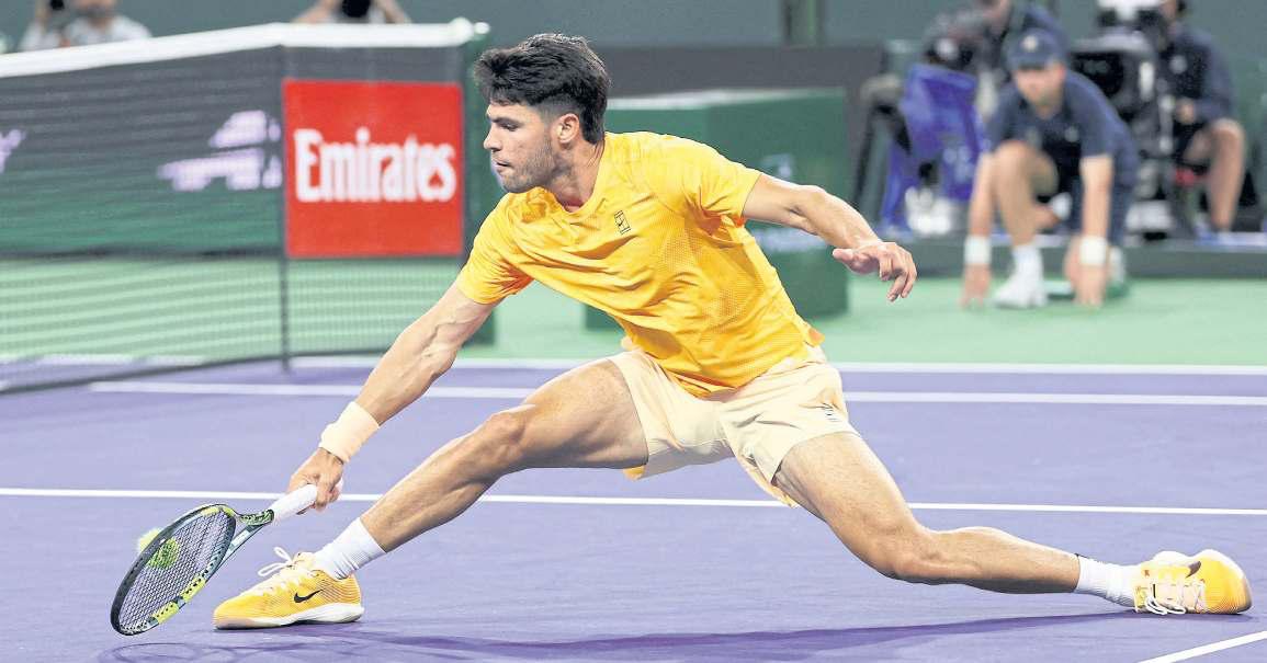 Alcaraz digs deep to put down Rinderknech
