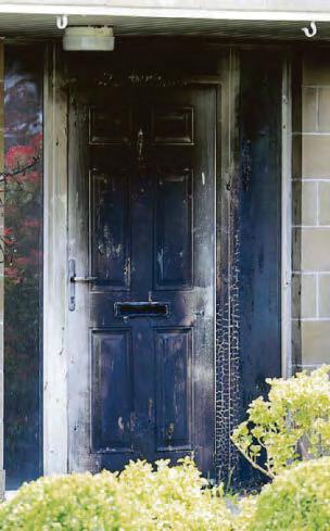 Plush home of gang leader's pal is torched as his kids sleep inside