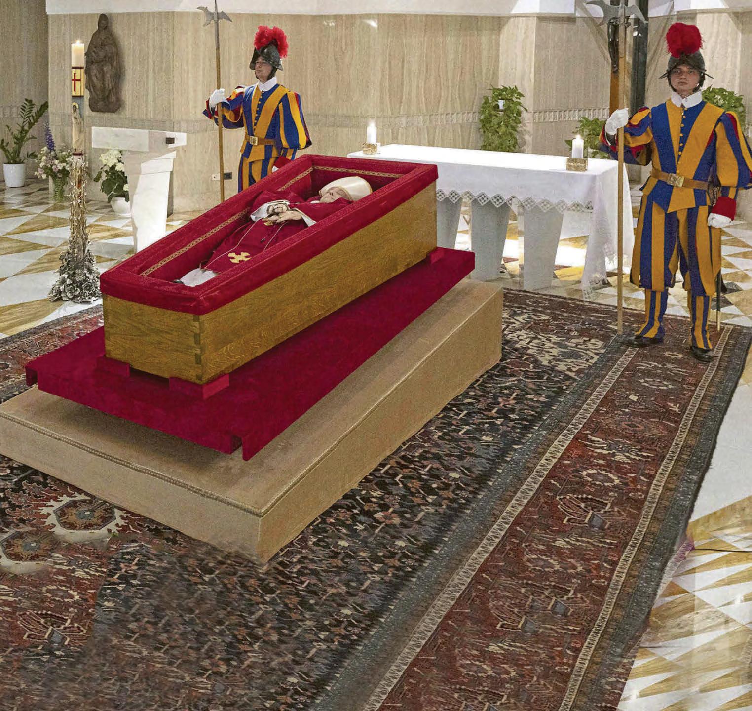 In an open casket the Pope is finally at peace