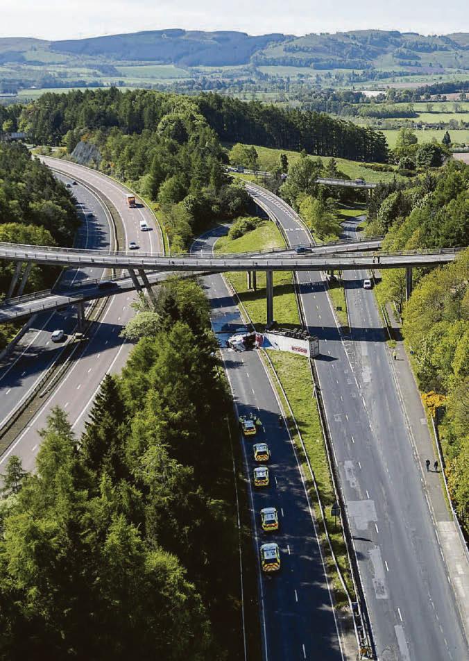 Lorry plummets from M90 flyover to road