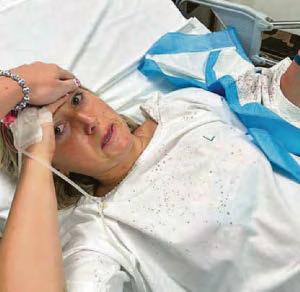 Shark attack Briton flies home for op