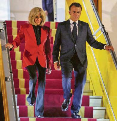Wife 'slaps' Macron in the face