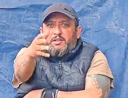 Migrants putting on rags before begging on billionaires' row