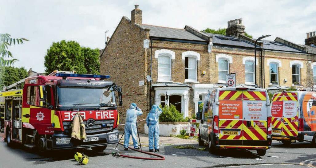 Murder arrest as woman found stabbed after blast