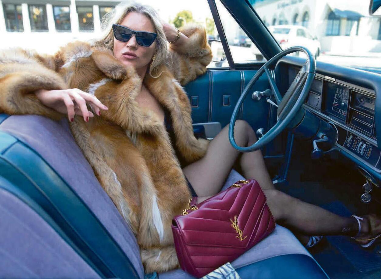 Chauf-fur Kate has bags of style...