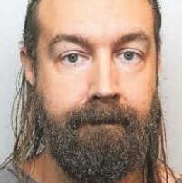 Predator cop's sex with raid victim