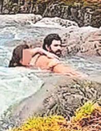 Hero saves swimmer at edge of waterfall