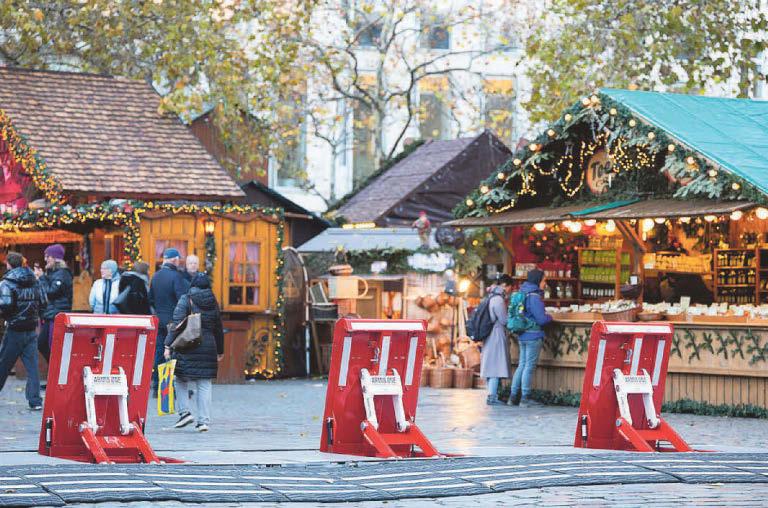 Terrorists have won if we cower behind Xmas stall barriers