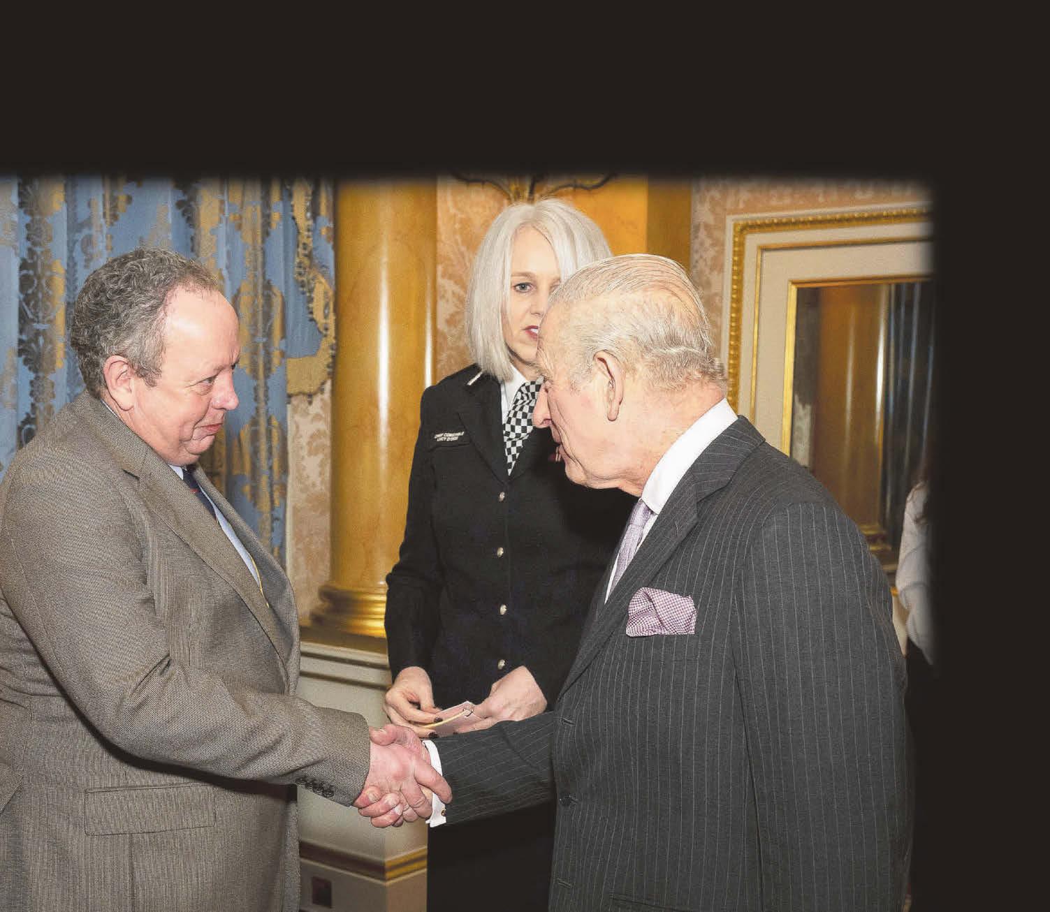 King greets heroes of train stab horror