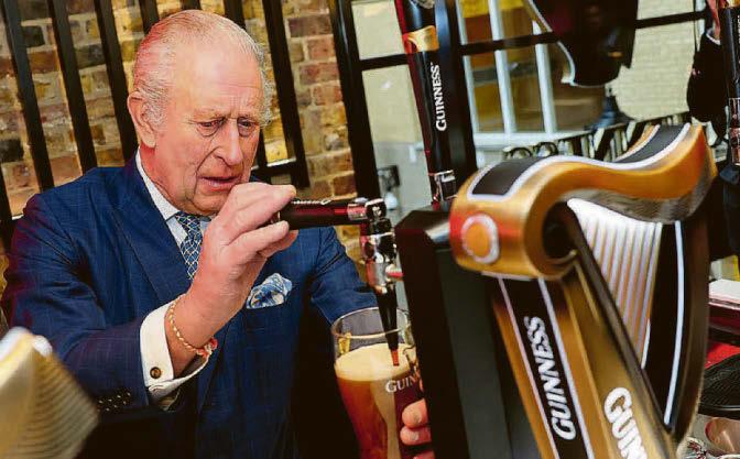 King pours perfect pint of 'great stuff'