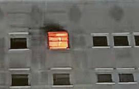 Teen arrested after fire at flats