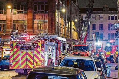 Street shut after blaze engulfs city centre hotel