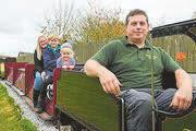 Chuffed dad builds railway in garden