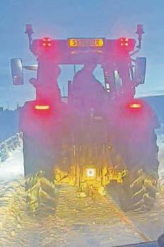 Newborn is delivered right to front door... by neighbour's tractor