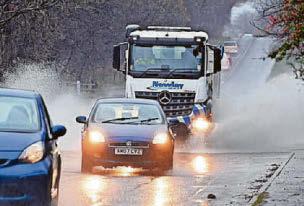 Torrential rain sparks flood alert for Scots