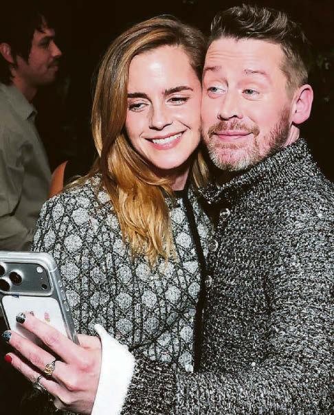 Macaulay's never phone alone with selfie star pals