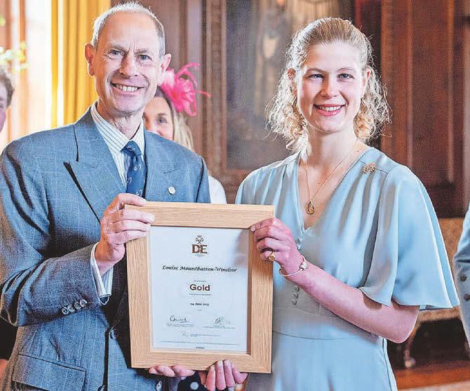 Golden girl Louise receives Duke of Edinburgh award from proud father