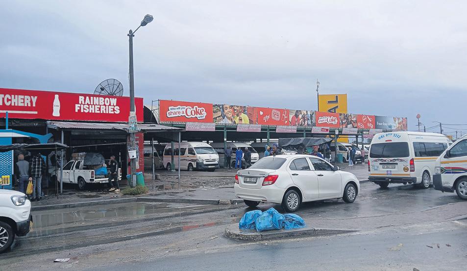 Police probe killings at taxi rank