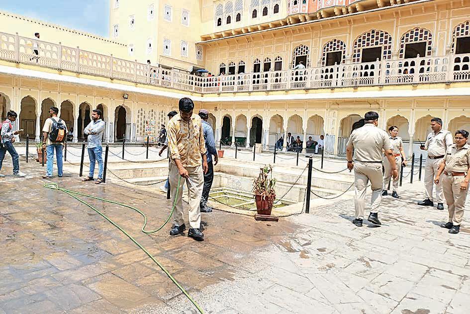 Water sprinkled at monuments to provide respite from heat