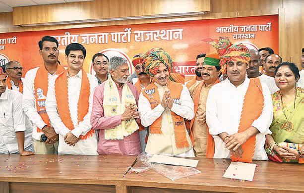 Rathore inducts representatives from AAP and Zamindara Party