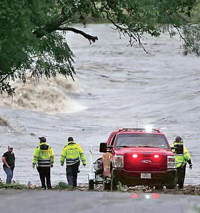 Storm floods Texas river, 24 dead, girls missing