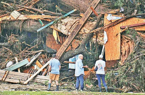 Texas floods leave 51 dead, 27 missing as rescuers comb through ravaged landscape