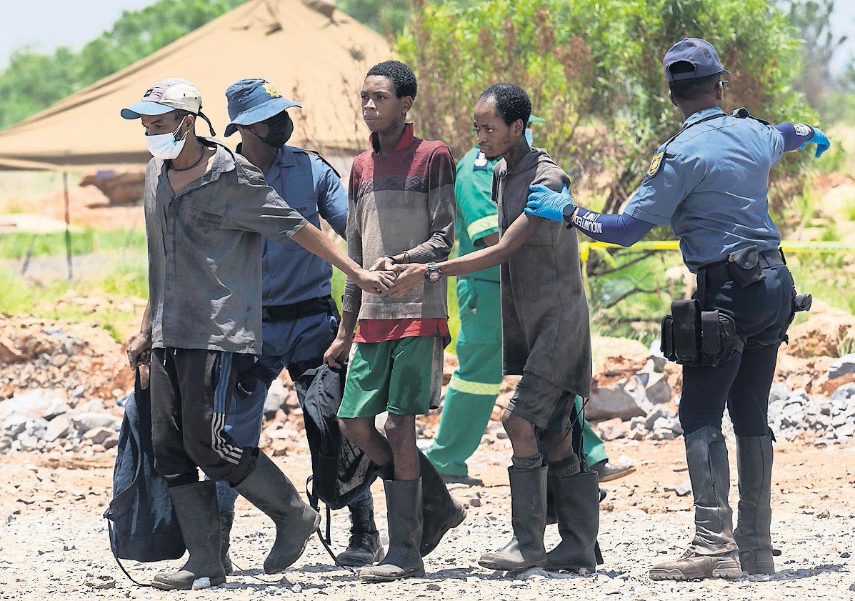 Mine rescue Families cling to hope as bodies are brought to the surface