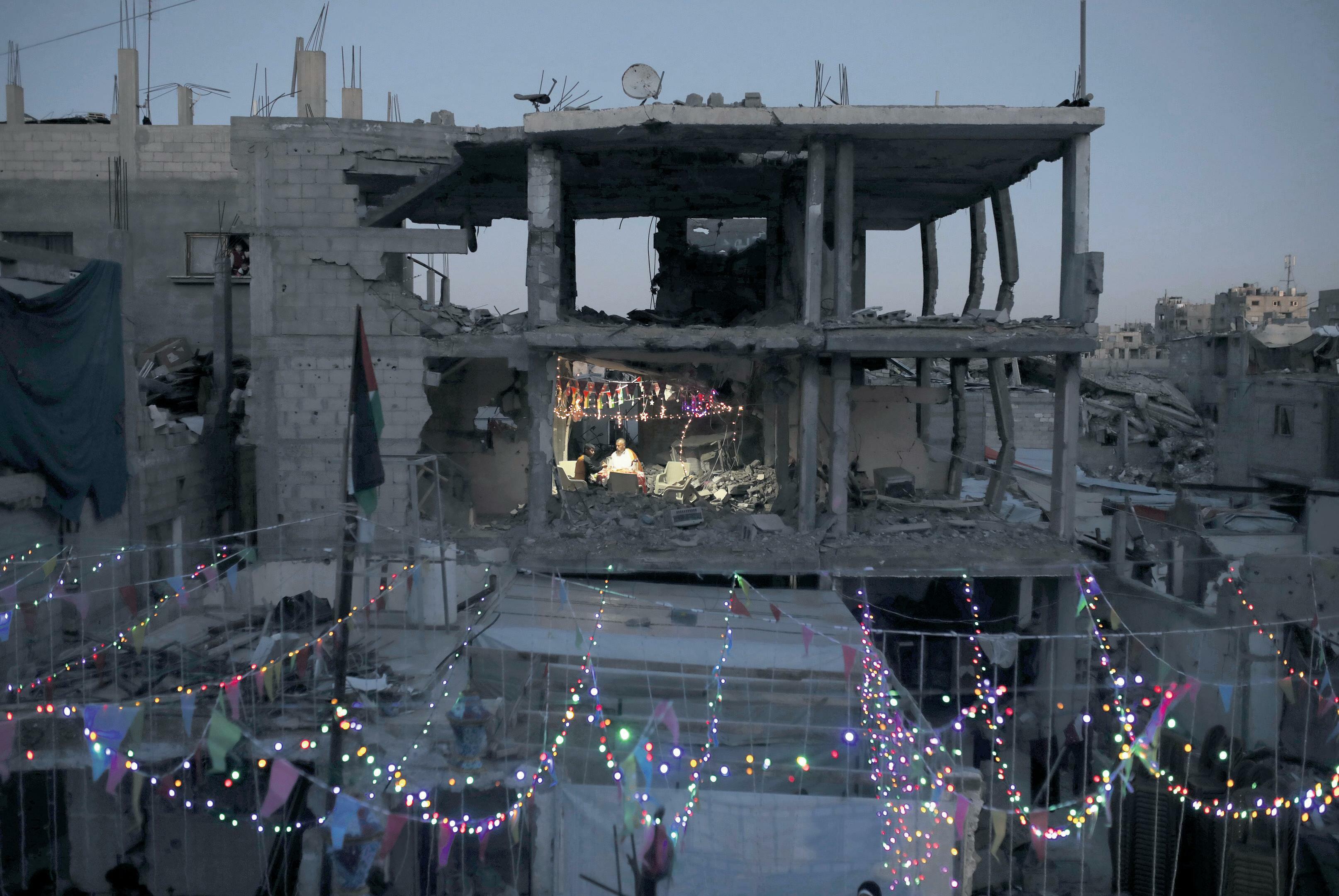 Israel attempts to force a change to terms of ceasefire agreement by cutting off aid to Gaza