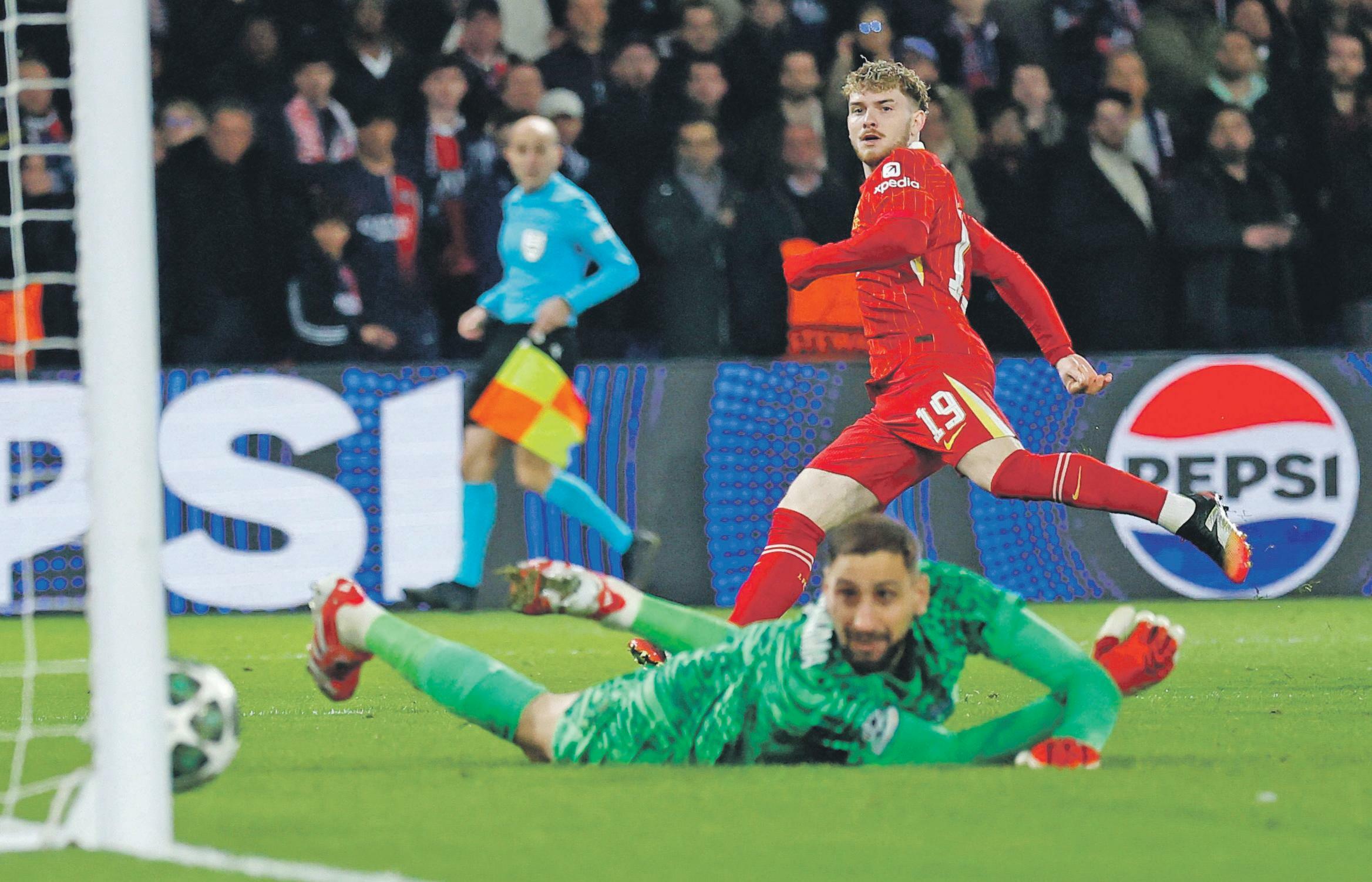Elliott stuns PSG as Liverpool weather storm to grab advantage