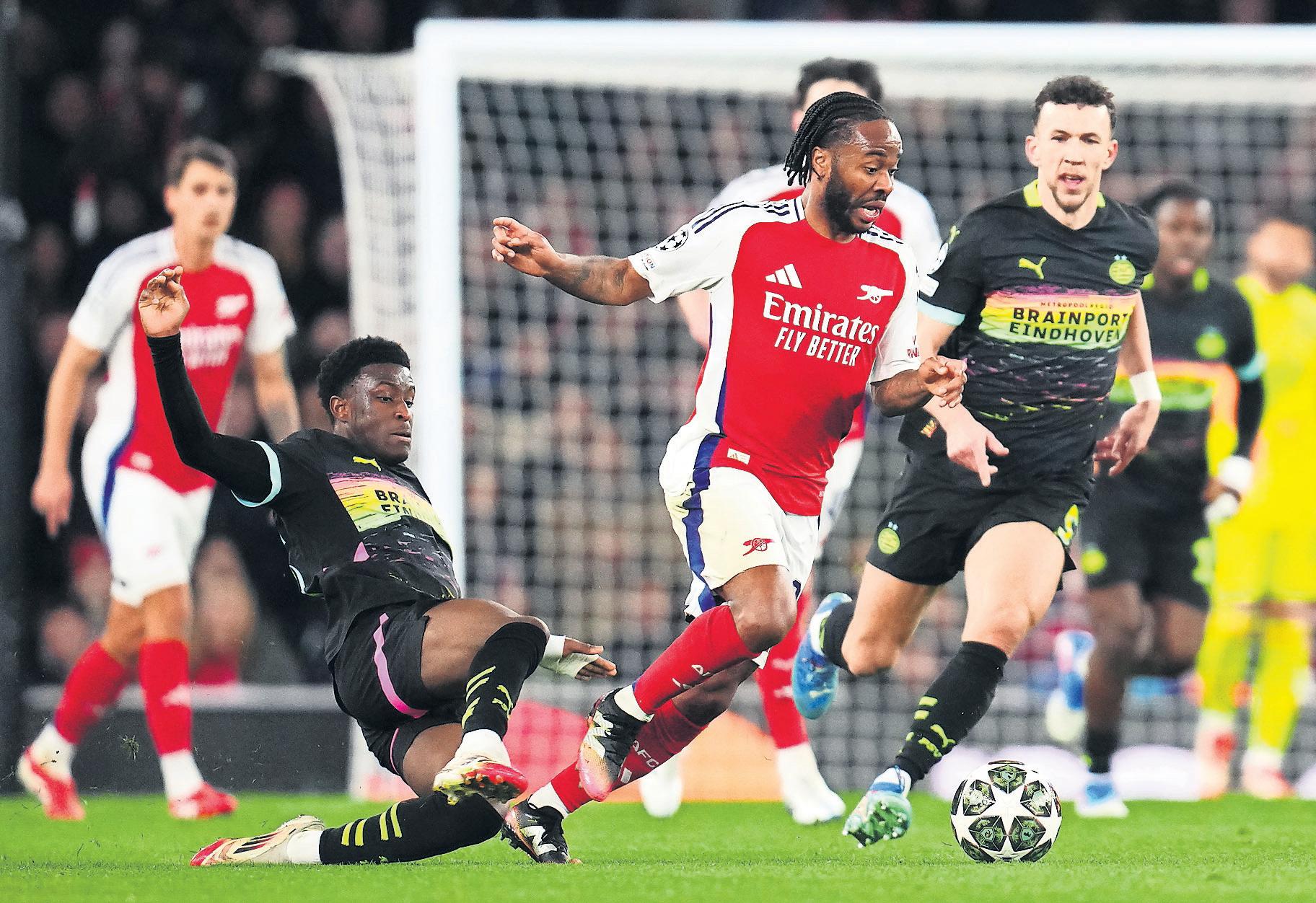 Driouech's deft chip earns PSV draw but Arsenal march on