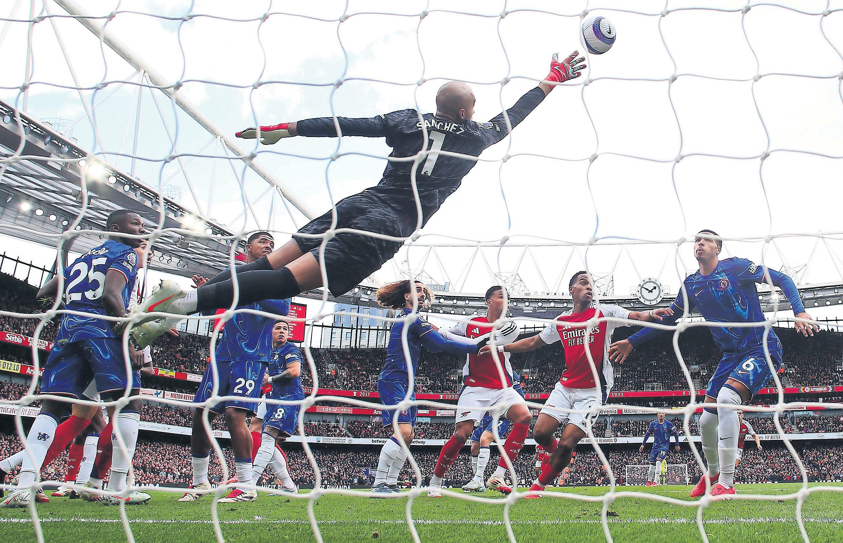 Merino sinks lacklustre Chelsea and keeps Arteta's slim hopes alive