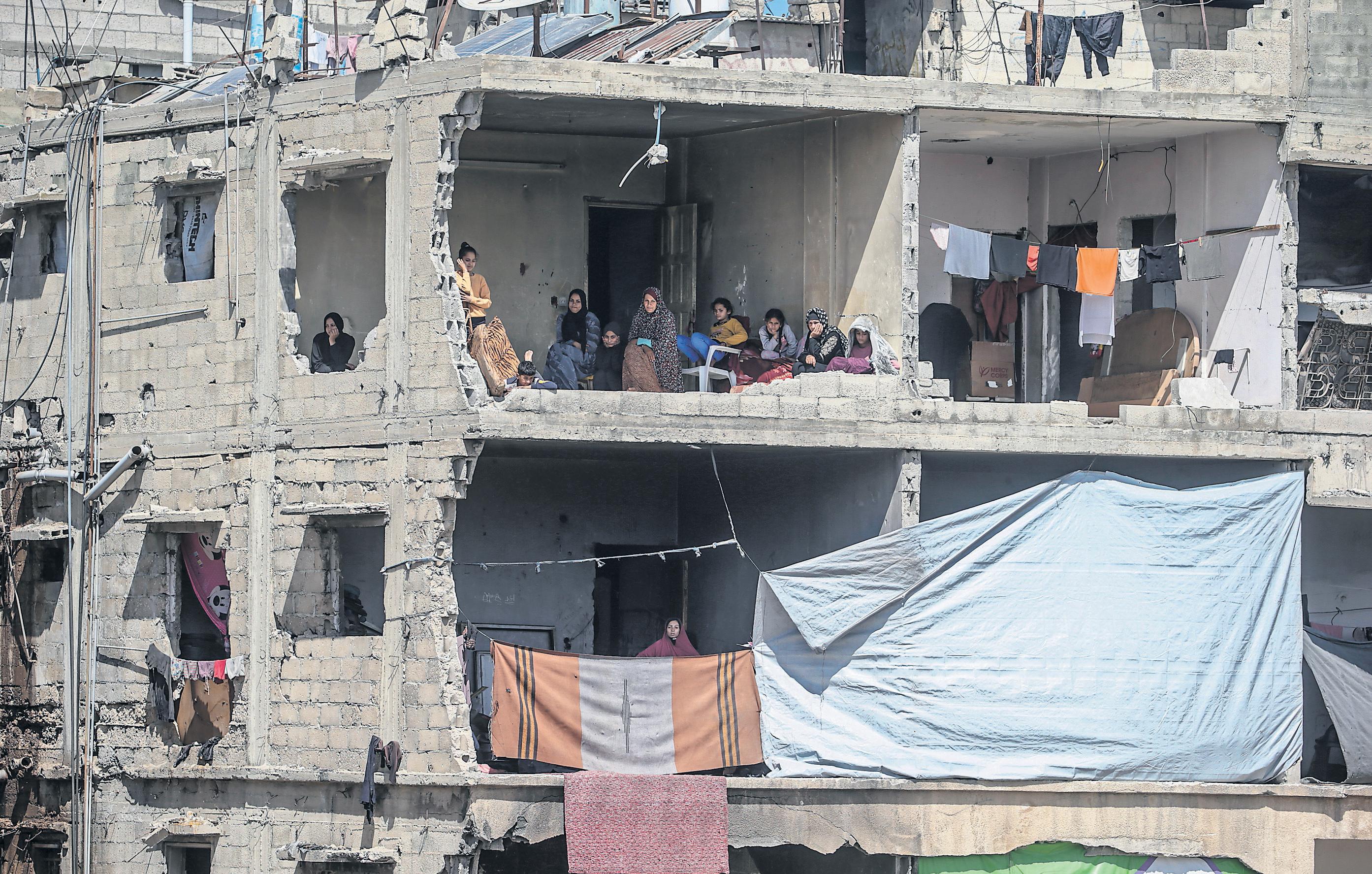 Israel sends in ground forces to take Gaza corridor as airstrike toll mounts