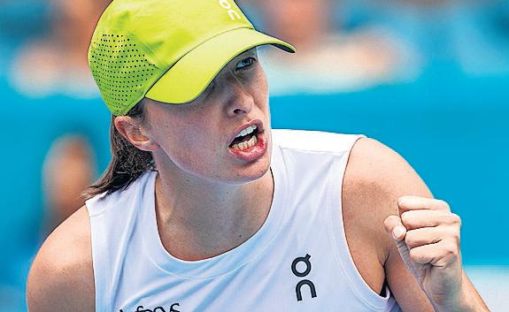 Sweet 16 for Swiatek after she makes history with Mertens win