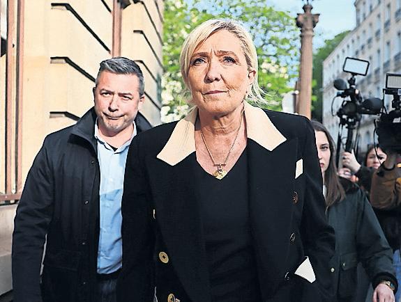 Le Pen's political future to be decided as verdict arrives in embezzlement case