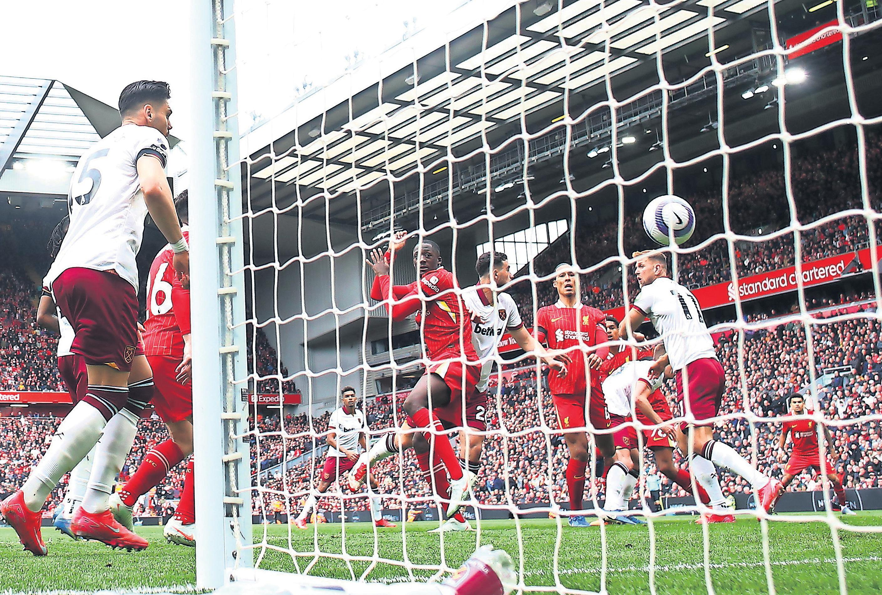 Van Dijk's rescue act edges title ever closer