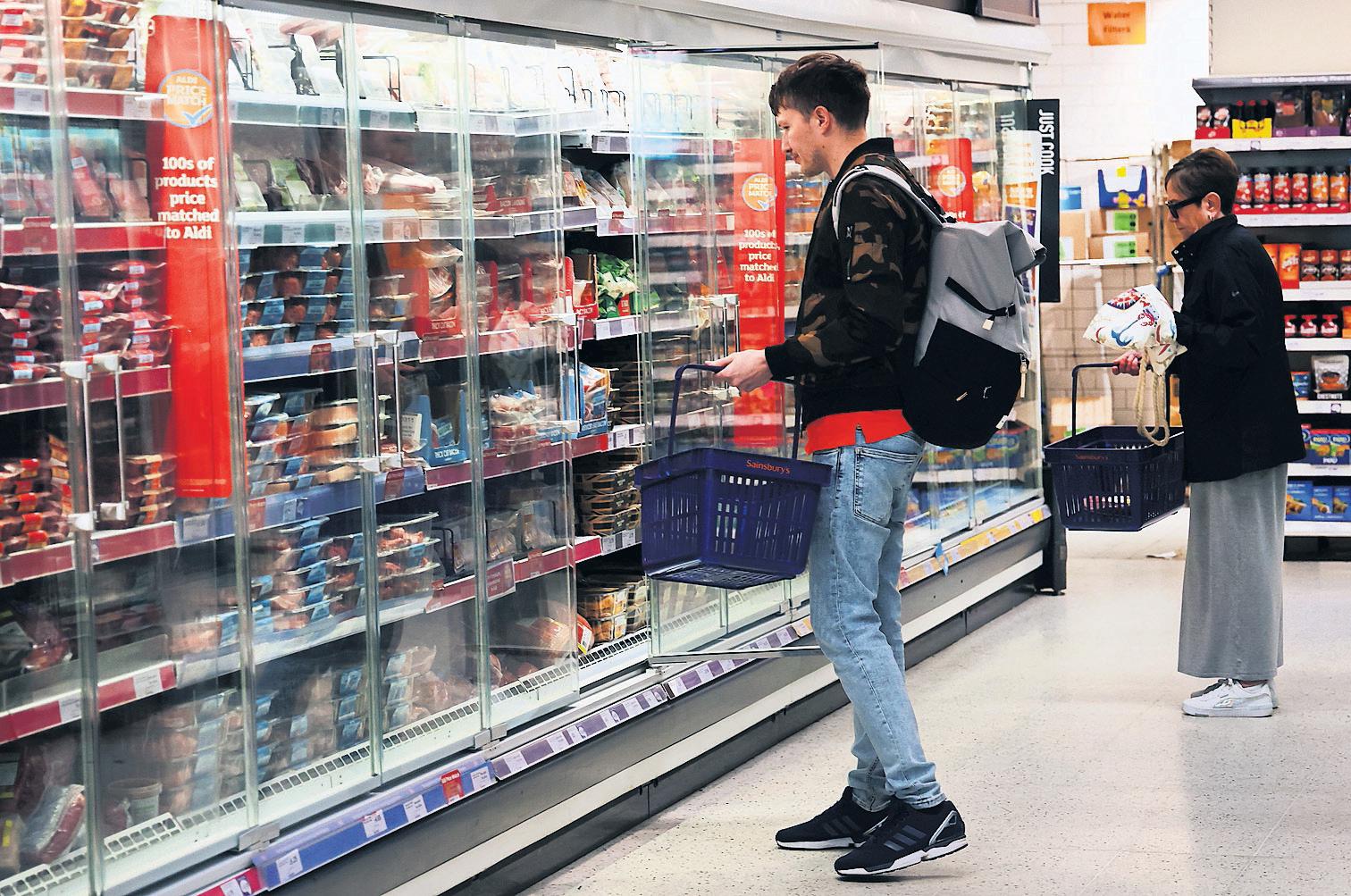 Sainsbury's says price war and rising wage costs will hit profits