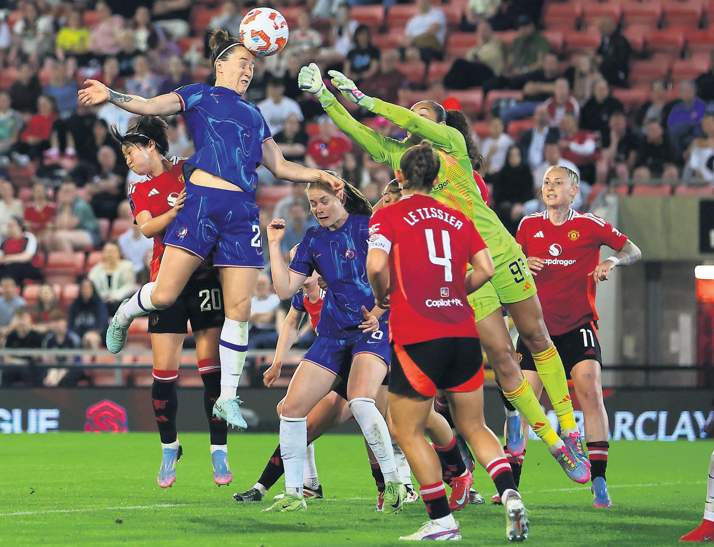 Bronze rises high to earn win at United and seal title for Chelsea