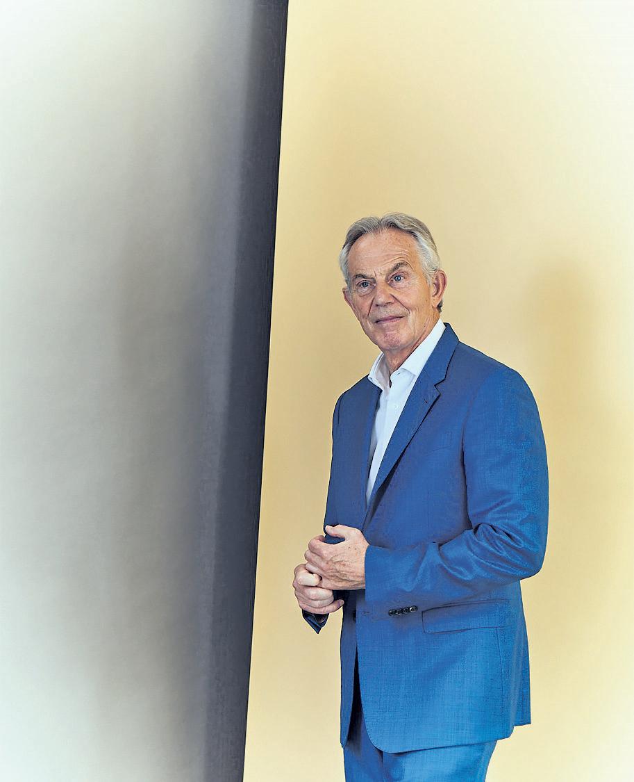 Blair rows back on net zero after No 10 fury