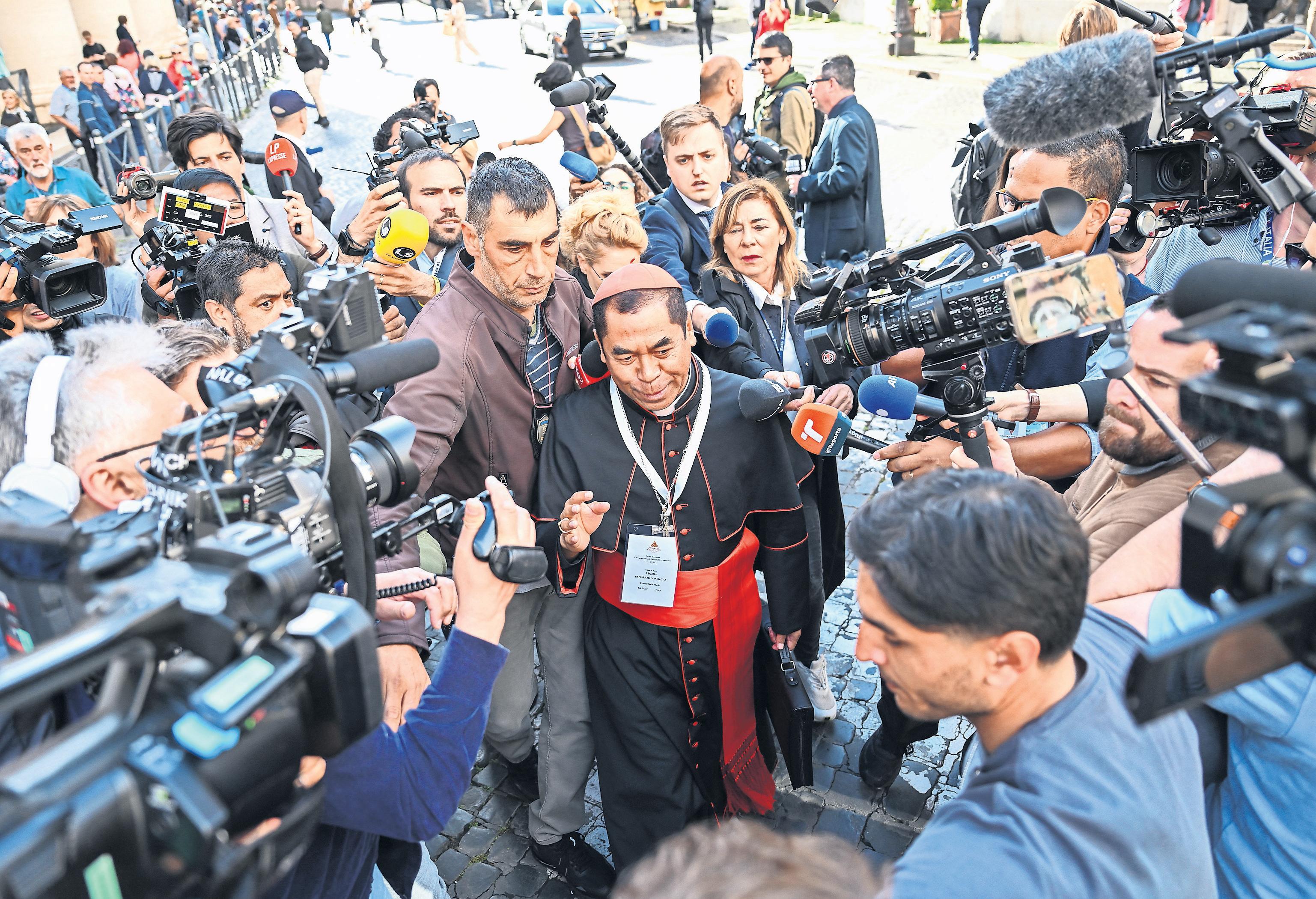 Speculation and secrecy as cardinals gather at the Vatican to elect new pope