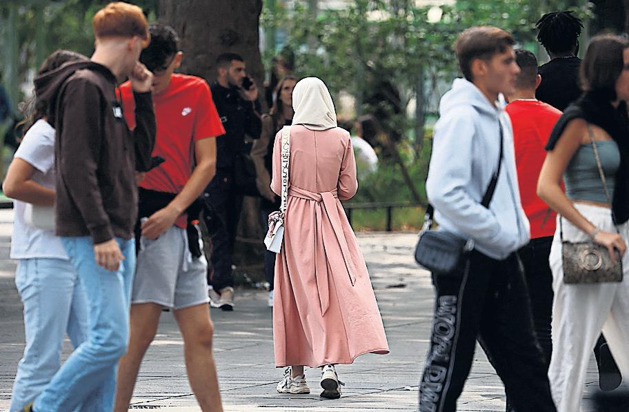 Macron party suggests ban on Muslim headscarf for under-15s