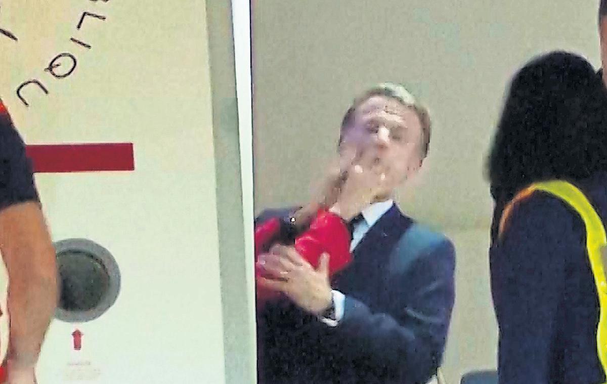 Macron denies fight with wife after video of 'right hook' on plane goes viral